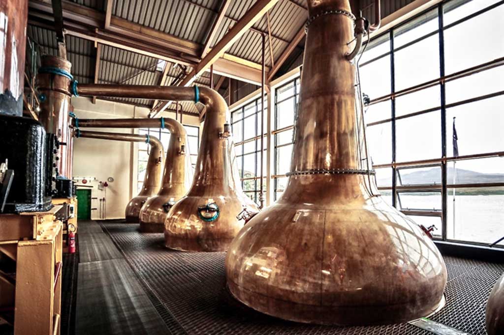 Copper stills inside the Caol Ila whisky distillery