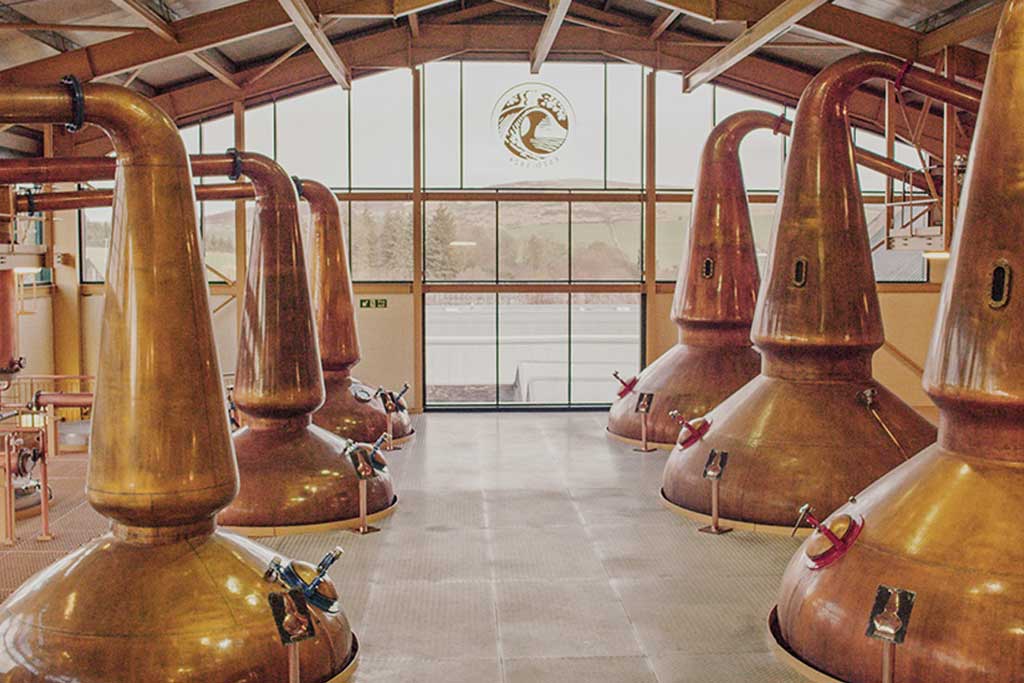 Pot stills within the Glenlivet whisky distillery in Speyside Scotland