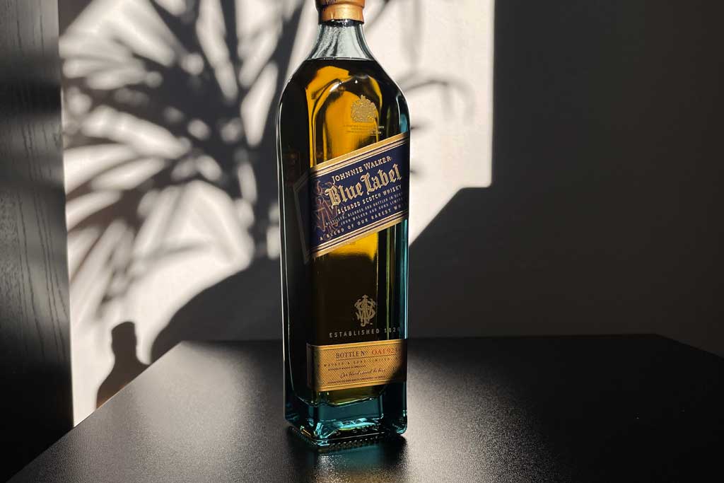 Bottle of Johnnie Walker Blue Label whisky in bright sunlight
