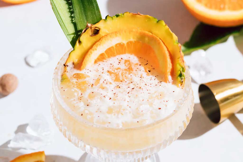 Close view of a whiskey pineapple cocktail
