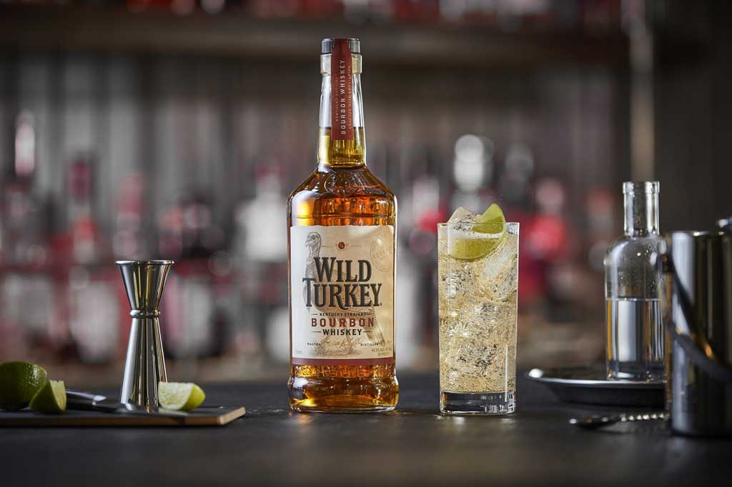 Wild Turkey 81 bourbon bottle on bar top