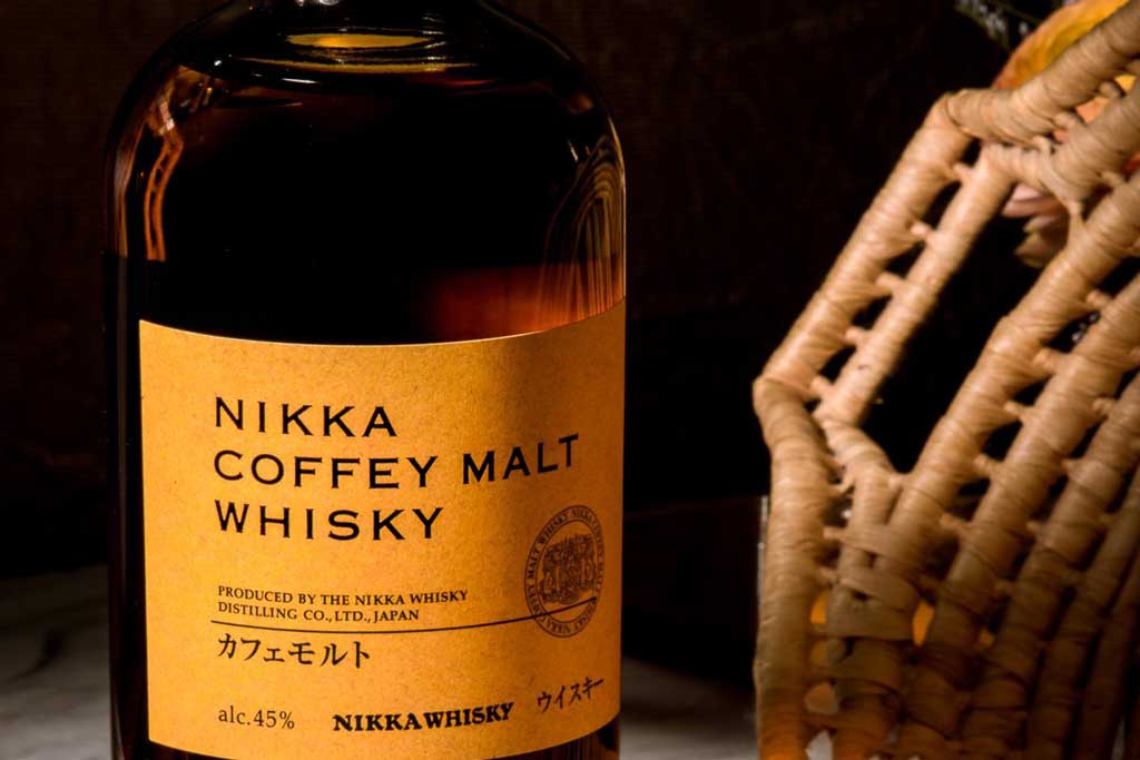 Close view of Nikka Malt whisky yellow label on bottle