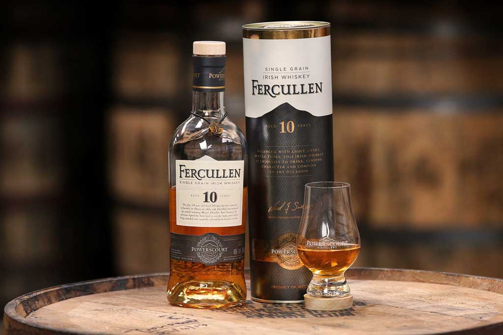 Bottle of Fercullen 10 Year Old Whiskey on top of whiskey barrel