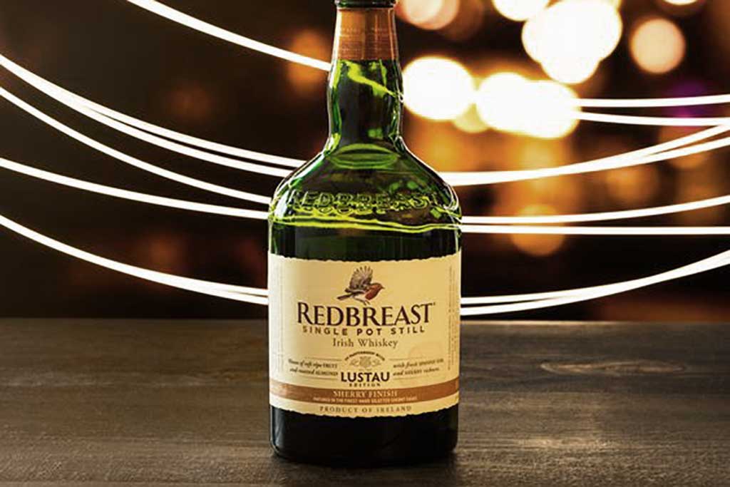 Bottle of Redbreast Lustau on wooden table