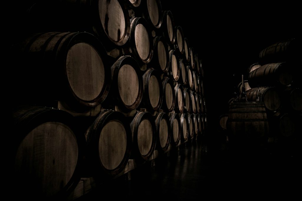 Why is whiskey aged in barrels?